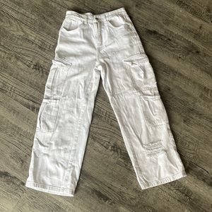 White cargo pants with four leg pockets